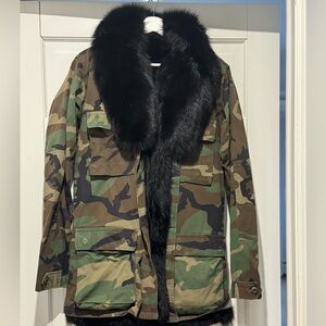 Camouflage Fur Jacket
Genuine Fox Fur
4 Flap pockets
Button closure

Final Sale